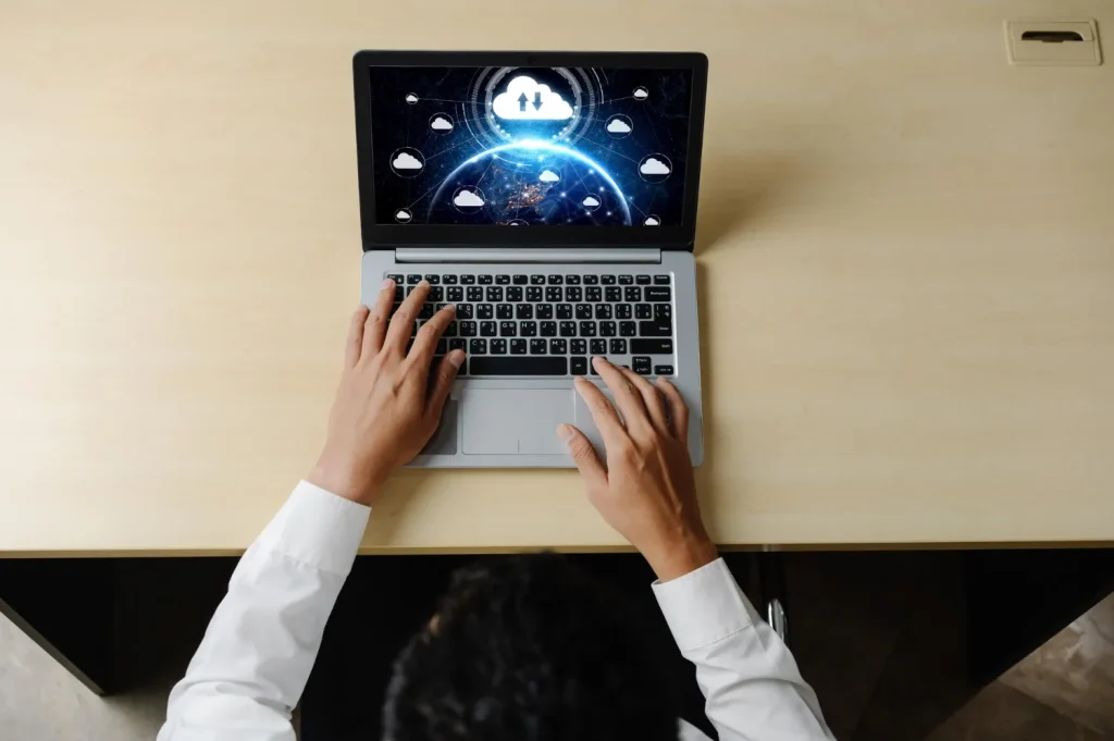 Ai robot hands laptop typing