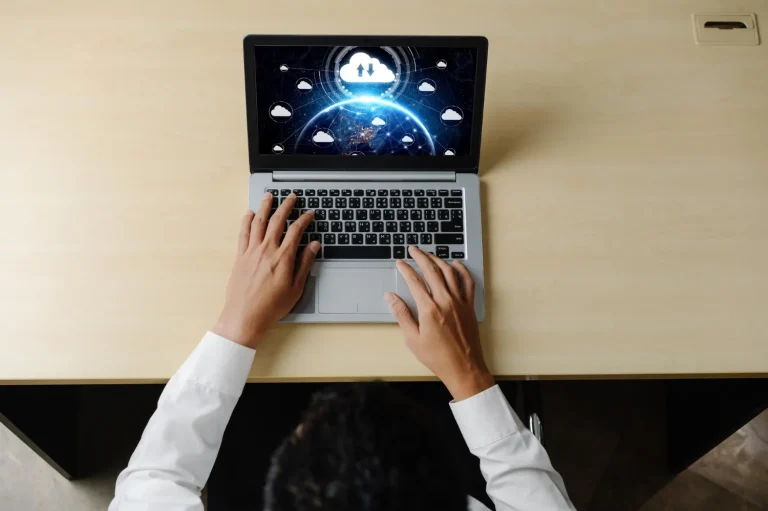 Ai robot hands laptop typing