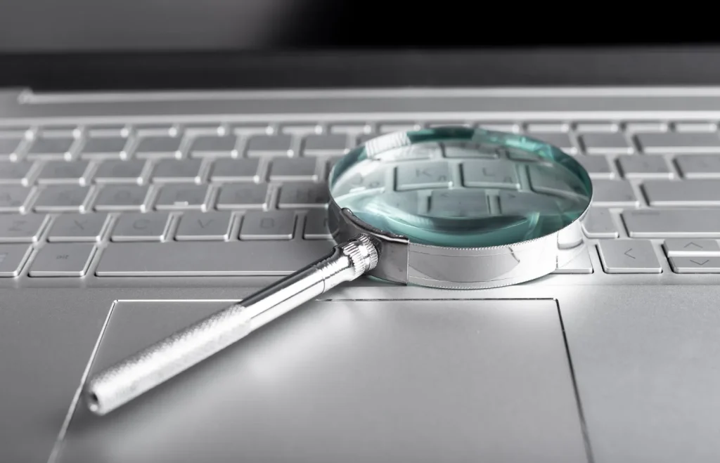 Magnifier laptop keyboard closeup